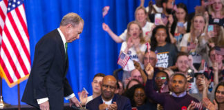 Ex-campaign staffer sues Bloomberg over layoffs, cites fraud