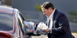 Doug Ducey calls up National Guard, halts surgeries