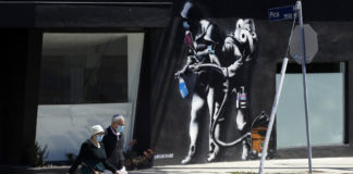 States confront practical dilemmas on reopening economies