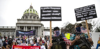 Swing-state Republicans pin virus fallout on Democrats