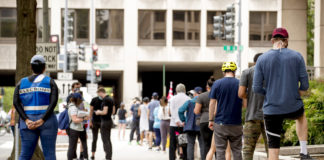 Curfews, pandemic test voters in primaries held amid unrest