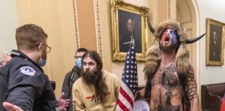 Arizona man who wore horns in riot seeks release from jail