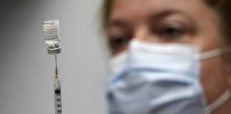 U.S. regulators give full approval to Pfizer COVID-19 vaccine