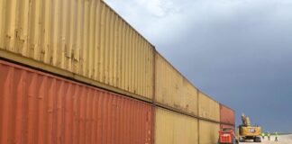 Shipping container wall lawsuit dropped, locals justify blocking flood of immigrants